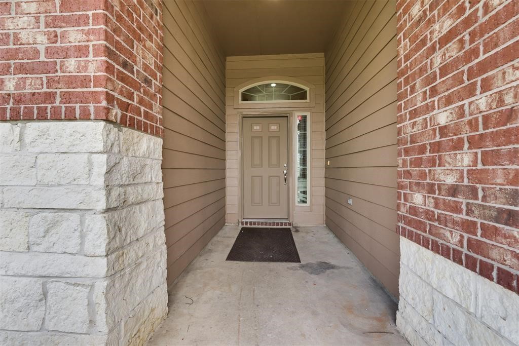 1903 Cadbury Castle Lane Fresno, TX 77545 - Photo 5 of 14 a view of a door of the house