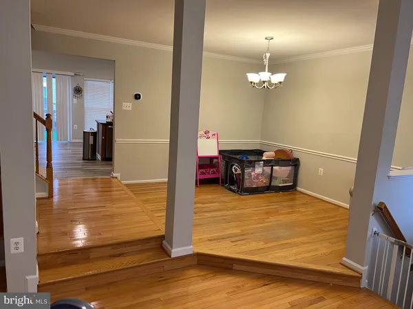 a view of a room with kitchen island