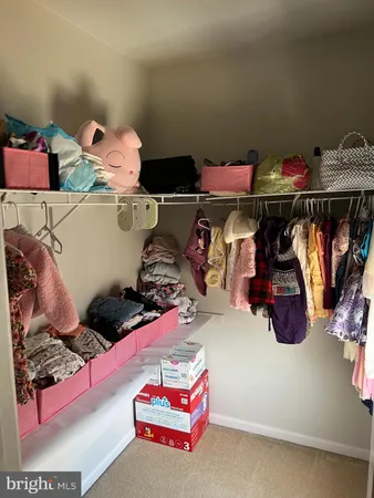 a bedroom with a bed and toys