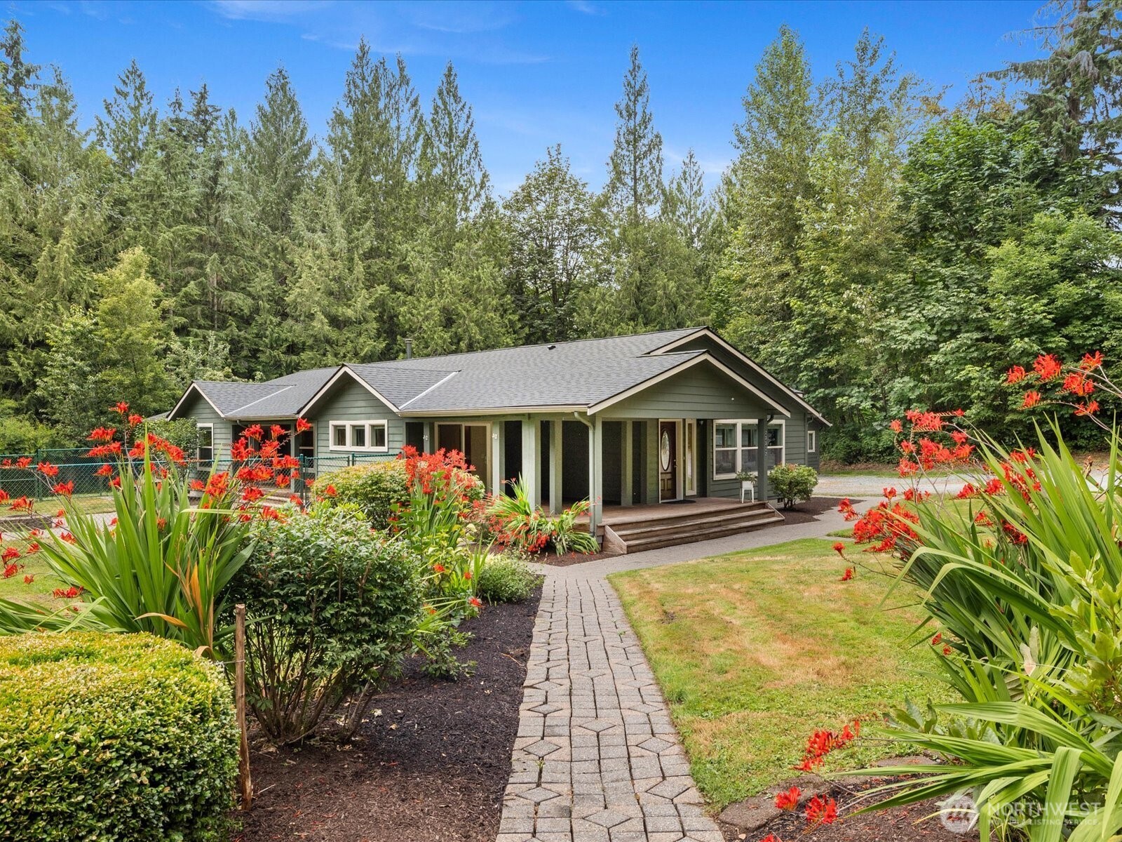 23322 North Lake Cochran Road Monroe, WA 98272 - Photo 31 of 40 a front view of a house with a yard