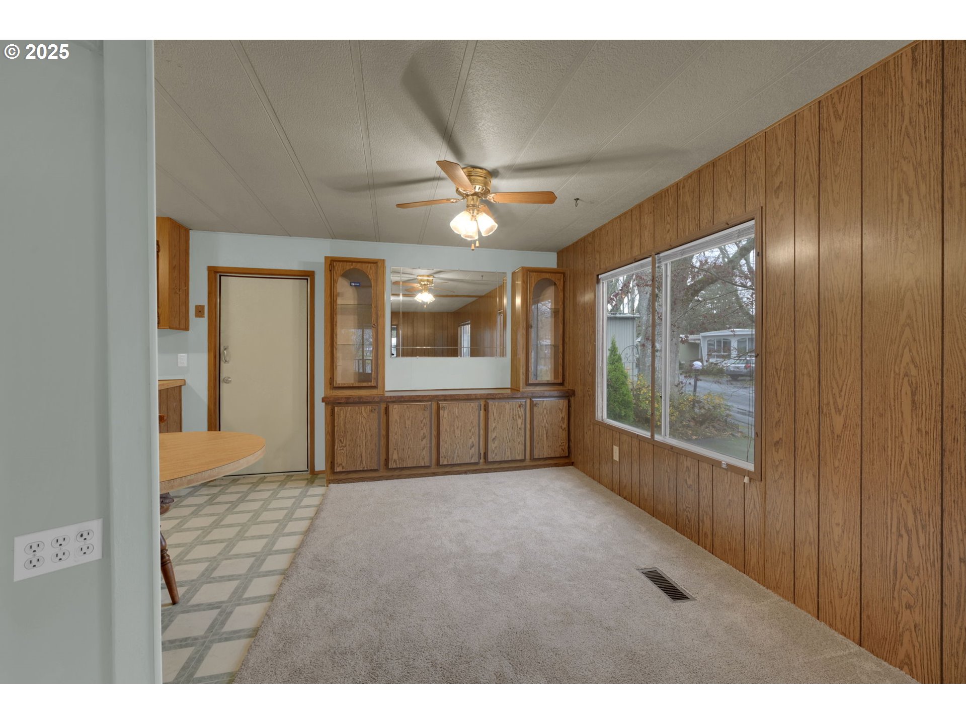 1475 Green Acres Road, Unit 13 Eugene, OR 97408 - Photo 17 of 39 a view of an empty room with a window