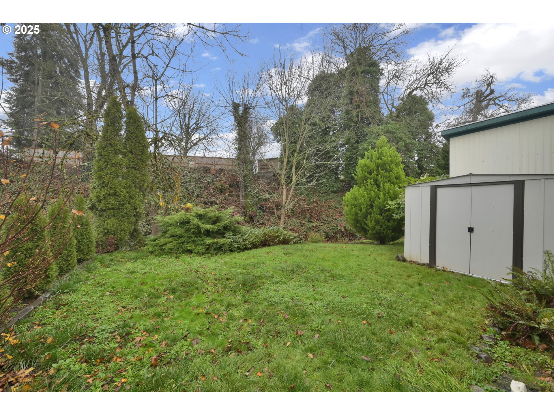 1475 Green Acres Road, Unit 13 Eugene, OR 97408 - Photo 35 of 39 a view of a back yard