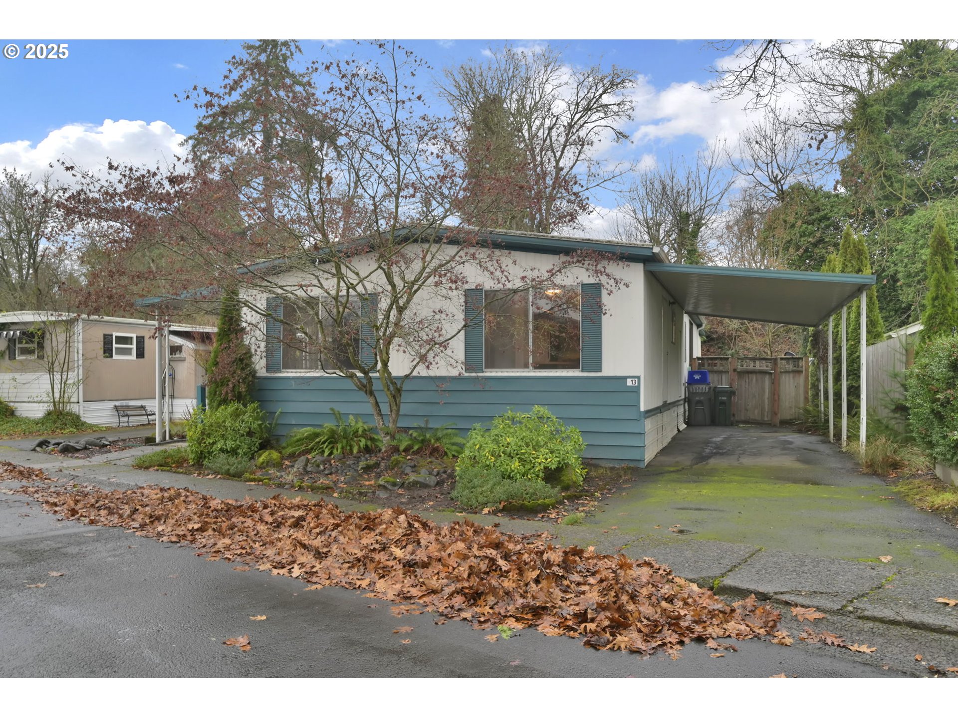 1475 Green Acres Road, Unit 13 Eugene, OR 97408 - Photo 38 of 39 front view of a house with a yard