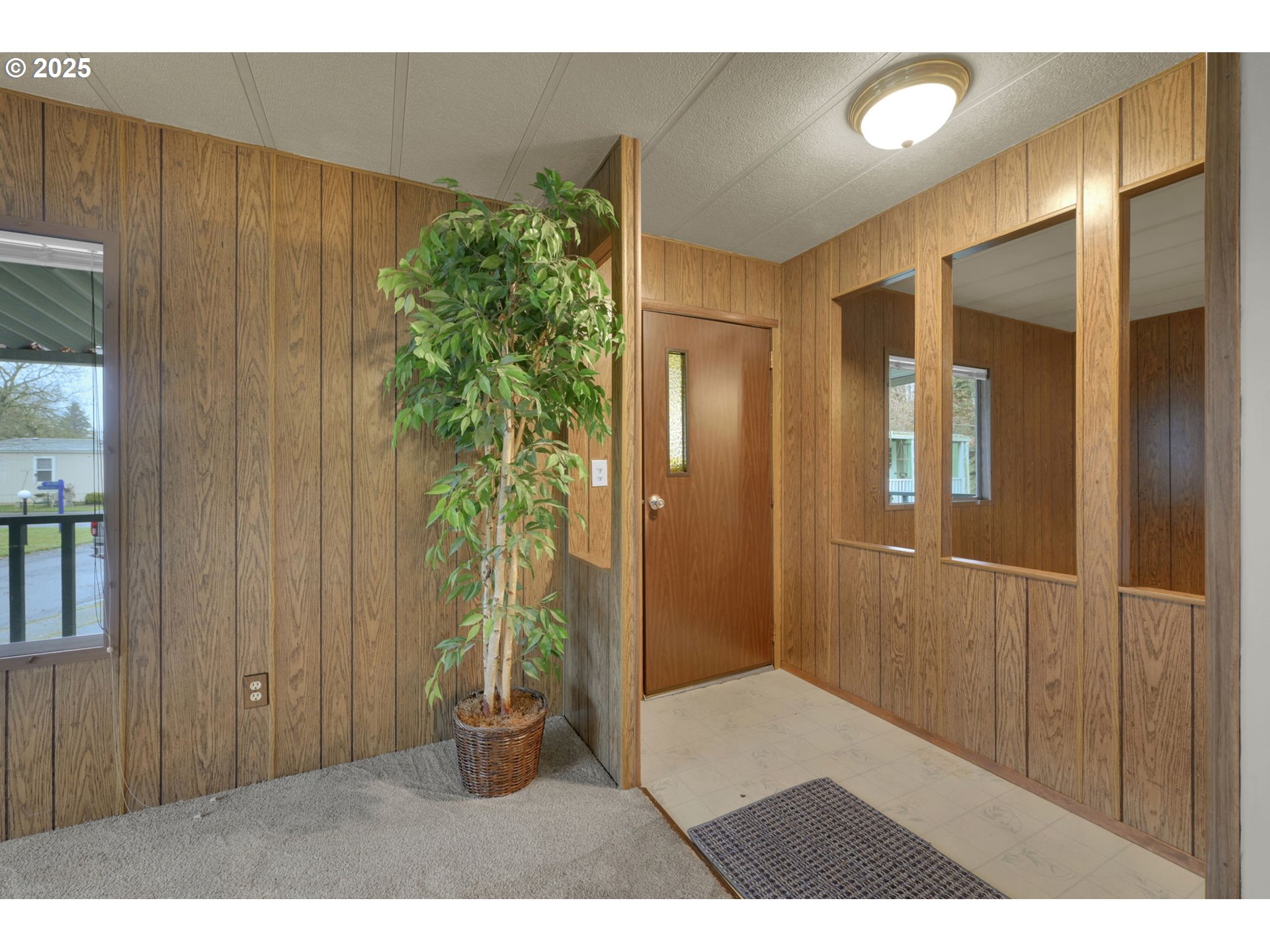 1475 Green Acres Road, Unit 13 Eugene, OR 97408 - Photo 6 of 39 a view of entryway with wooden floor