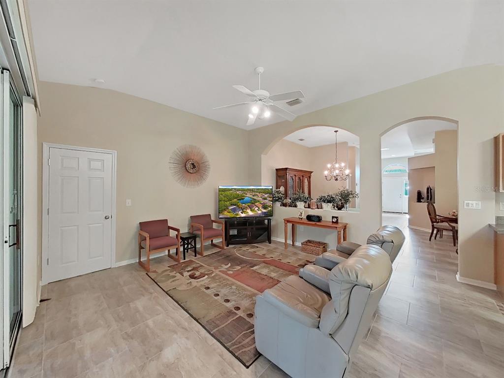 30612 Nickerson Loop Wesley Chapel, FL 33543 - Photo 14 of 47 a living room with furniture