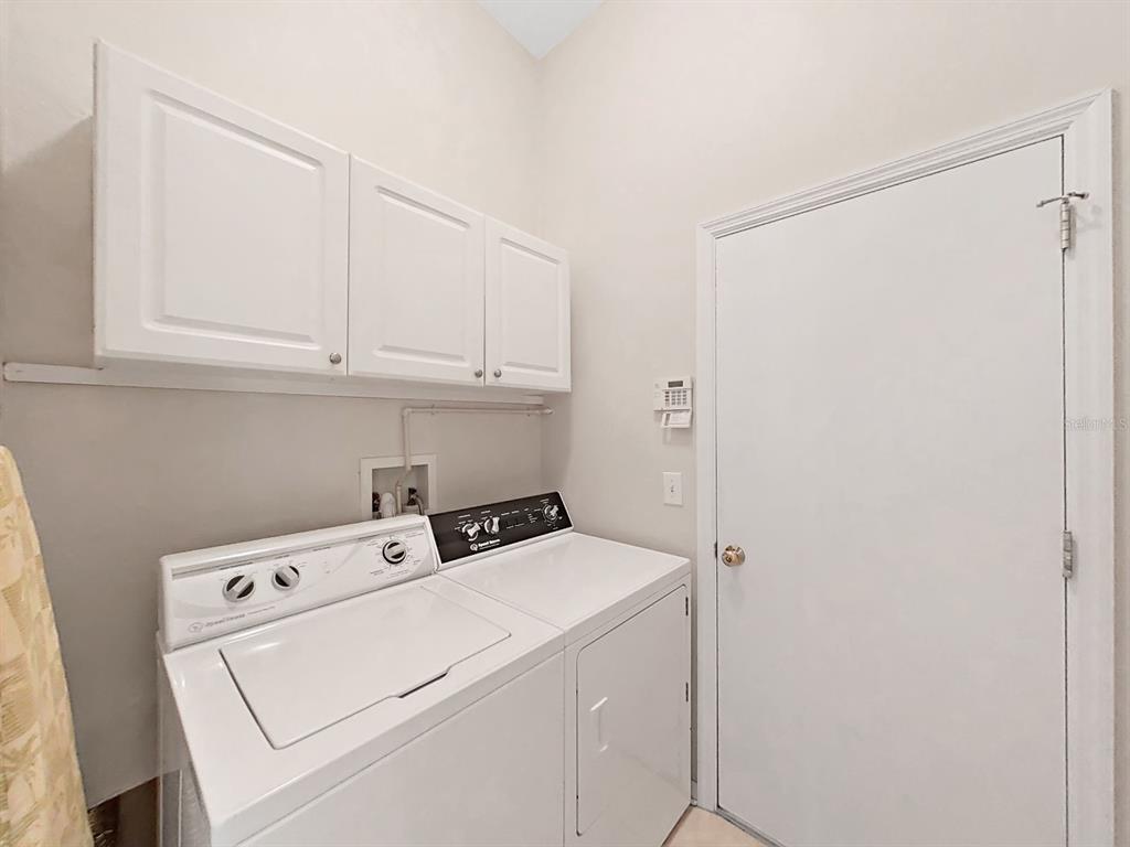 30612 Nickerson Loop Wesley Chapel, FL 33543 - Photo 38 of 47 a utility room with dryer and washer