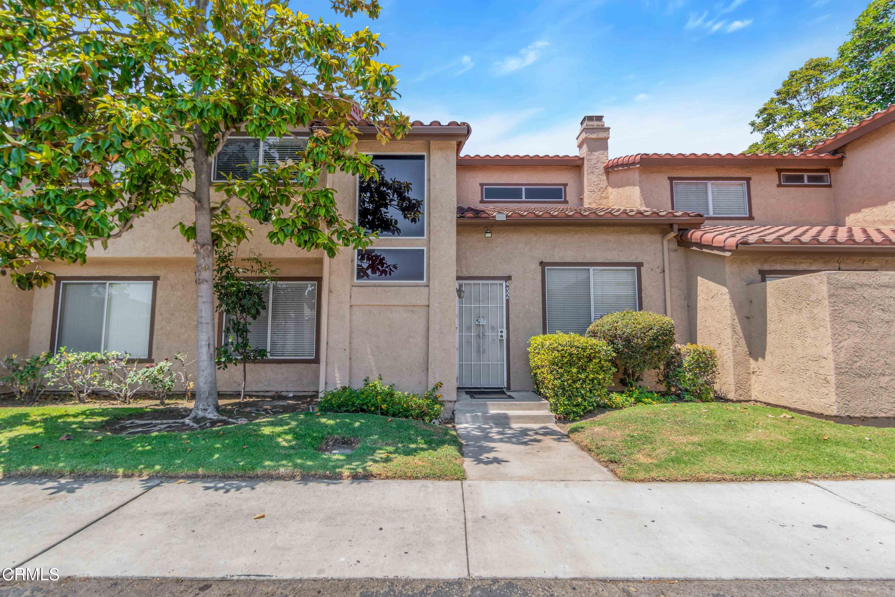 432 Johnson Road Oxnard, CA 93033 - Photo 1 of 40 a front view of a house with garden