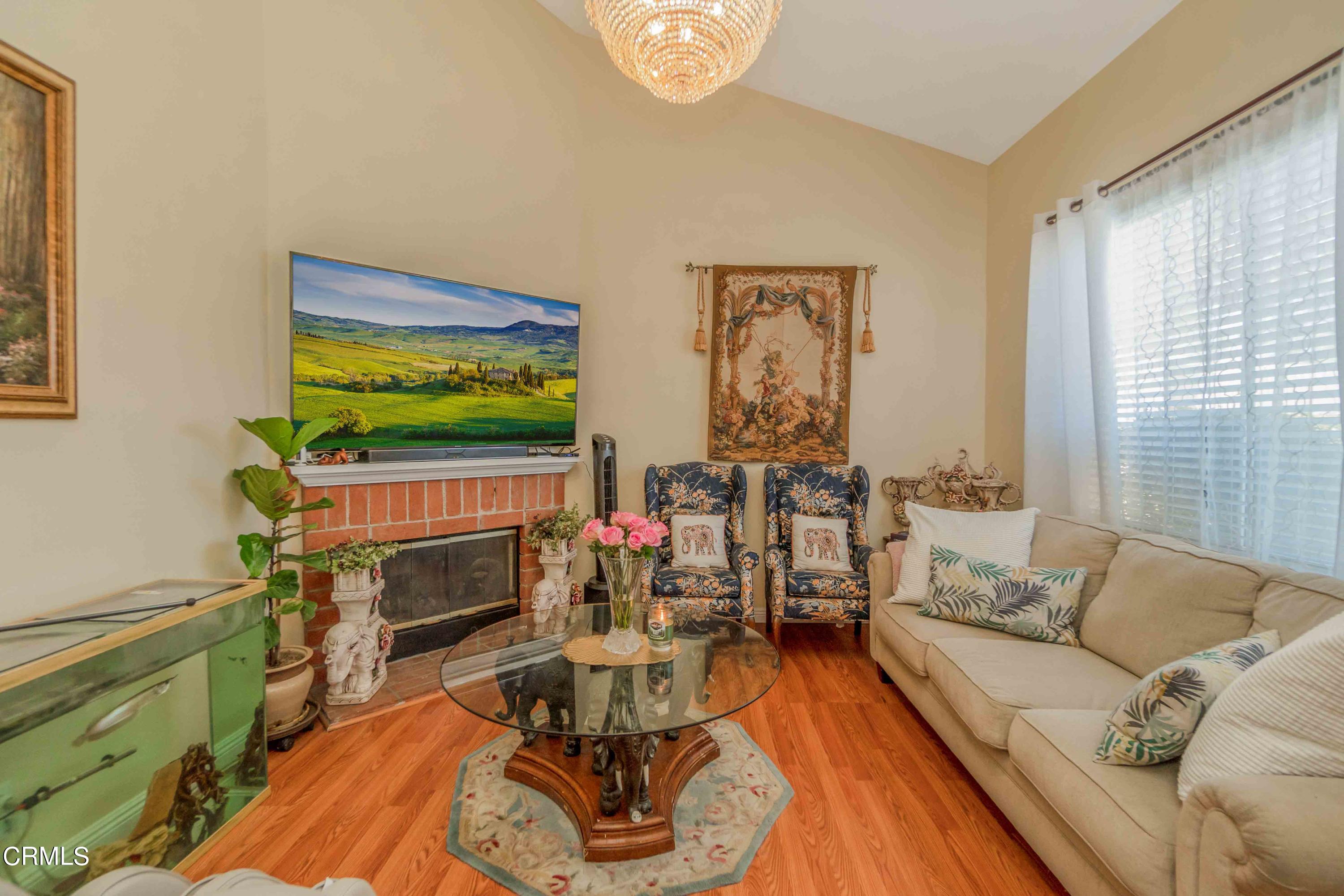 432 Johnson Road Oxnard, CA 93033 - Photo 18 of 40 a living room with furniture and a fireplace