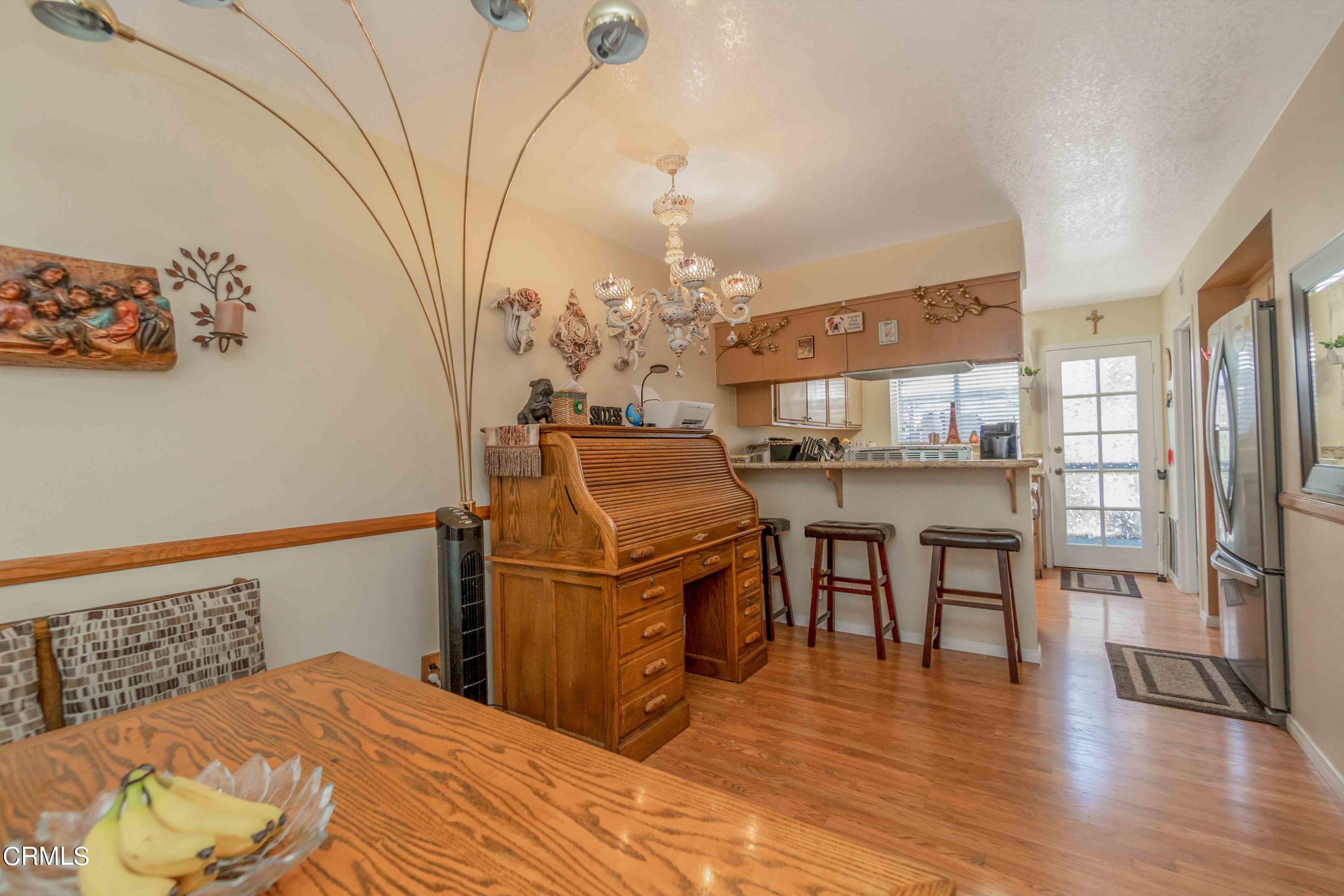 432 Johnson Road Oxnard, CA 93033 - Photo 24 of 40 a bed room with a bed and a table