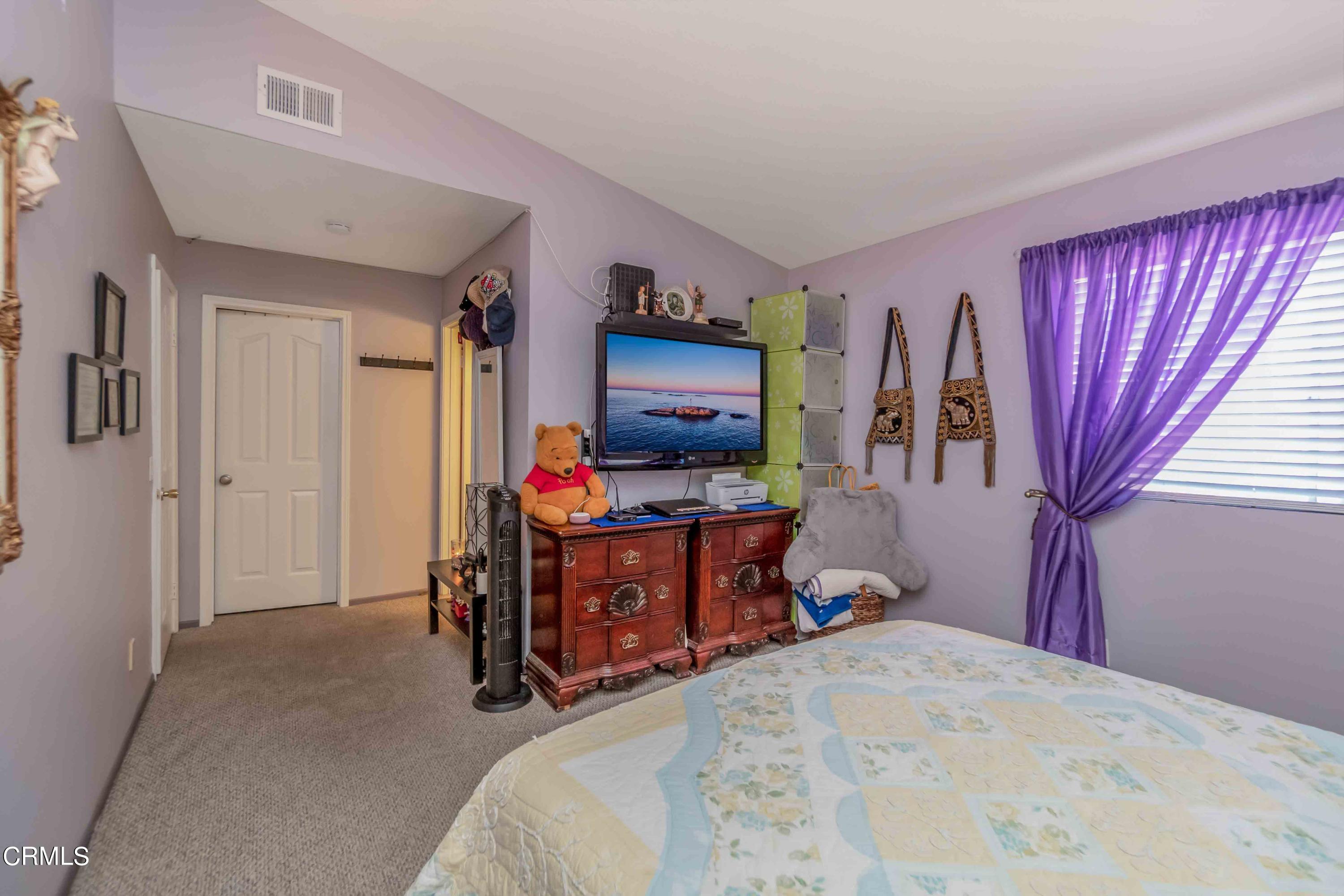 432 Johnson Road Oxnard, CA 93033 - Photo 37 of 40 a bed room with a bed and furniture