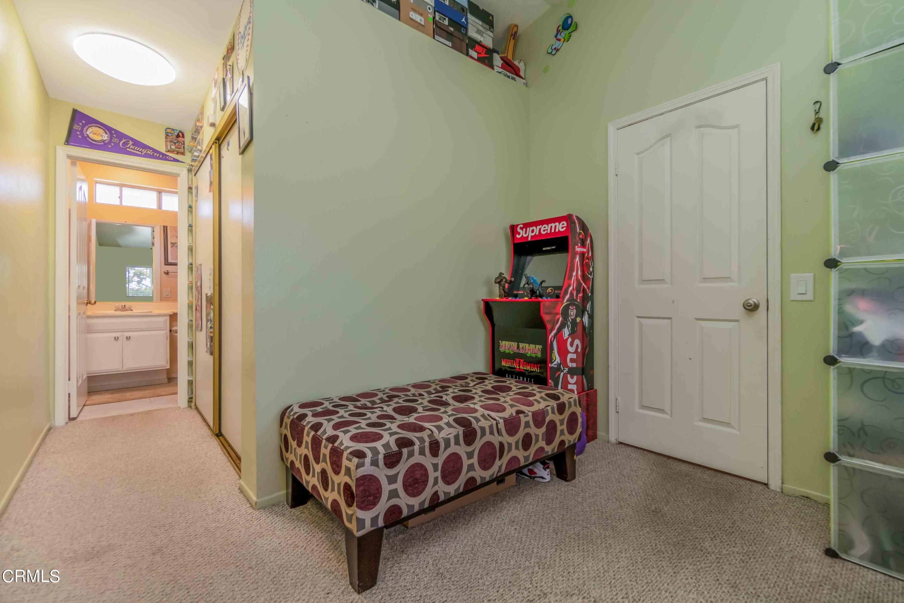 432 Johnson Road Oxnard, CA 93033 - Photo 40 of 40 a bedroom with a bed and a cabinets