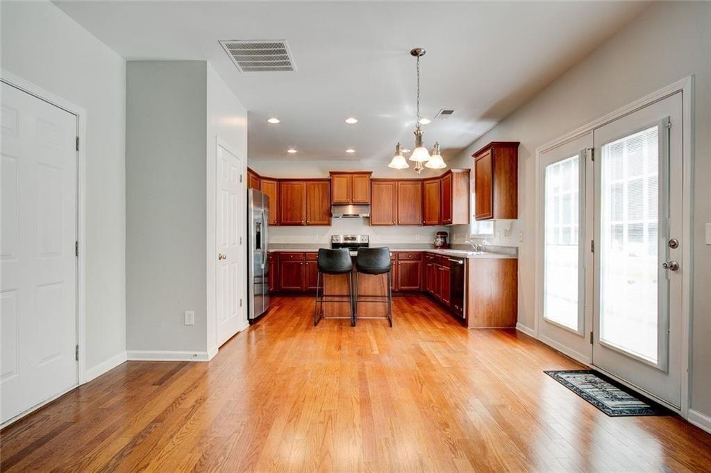 5025 Bishops Row Southwest Austell, GA 30106 - Photo 15 of 22 a view of a kitchen and dining room