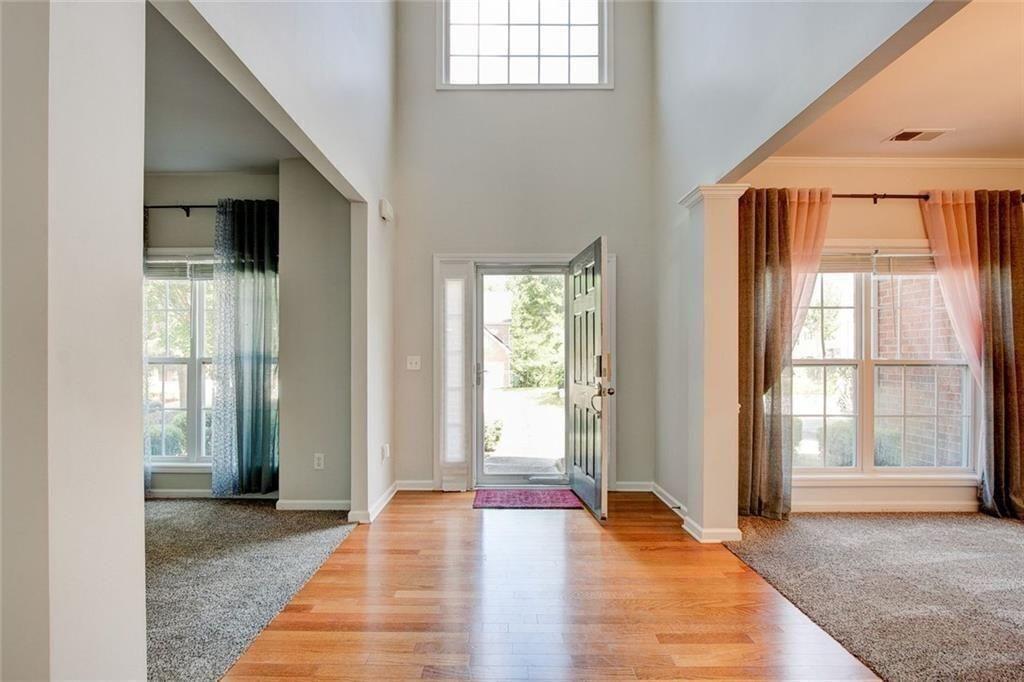 5025 Bishops Row Southwest Austell, GA 30106 - Photo 4 of 22 a view of an entryway with wooden floor and garden