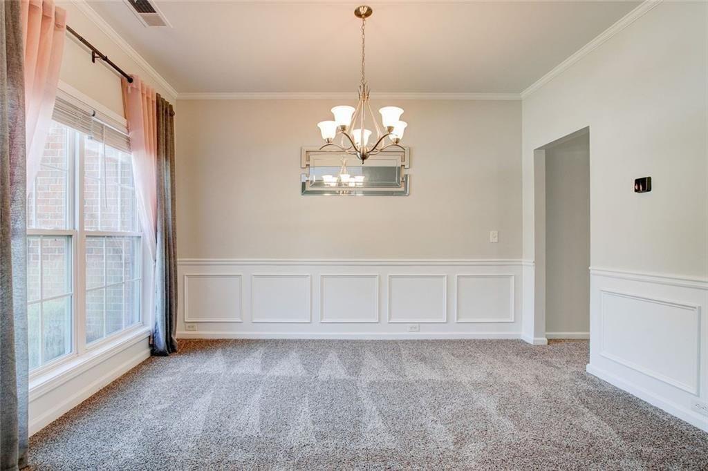 5025 Bishops Row Southwest Austell, GA 30106 - Photo 7 of 22 a view of an empty room with a window