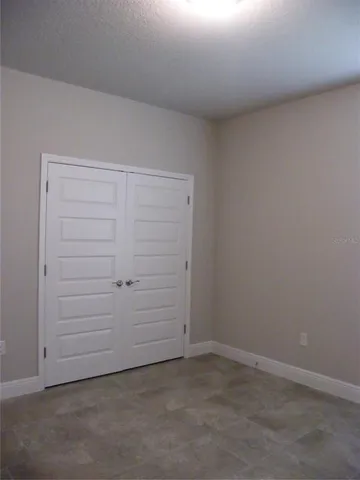 a room that has a table and chairs in it