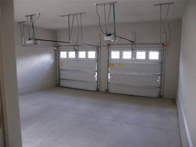 a view of a street with a building in the background