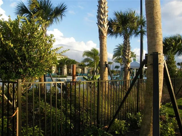 a view of a balcony with chairs