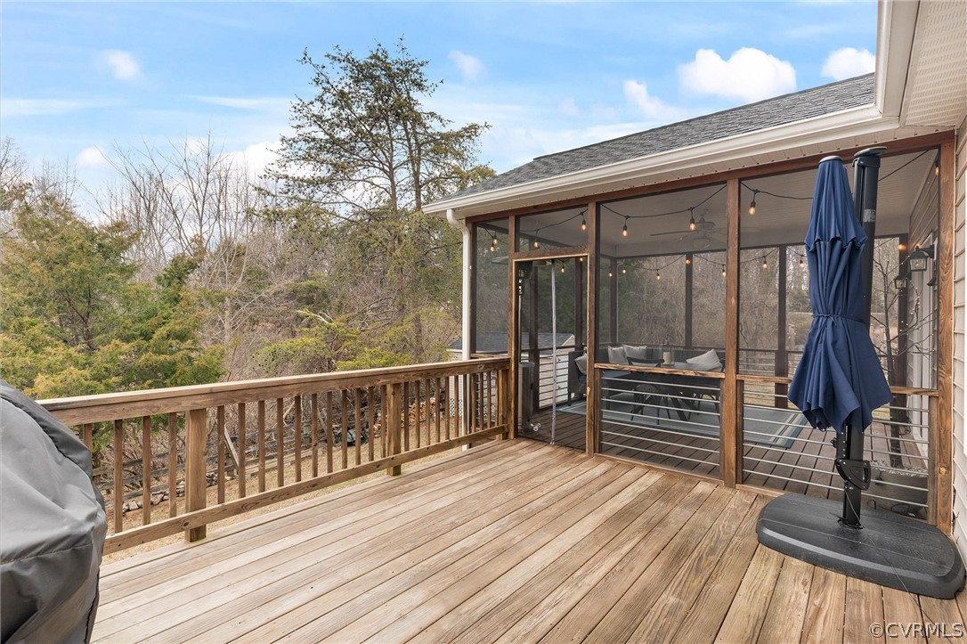 6150 Advance Mills Road Ruckersville, VA 22968 - Photo 11 of 50 a view of a balcony with wooden floor and fence