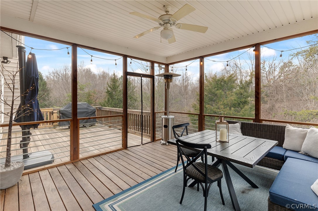6150 Advance Mills Road Ruckersville, VA 22968 - Photo 12 of 50 a view of a dining room with furniture window and wooden floor