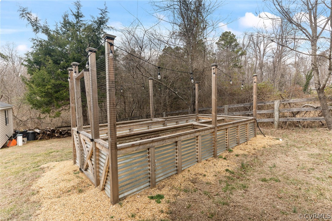 6150 Advance Mills Road Ruckersville, VA 22968 - Photo 17 of 50 a view of a outdoor space with chairs