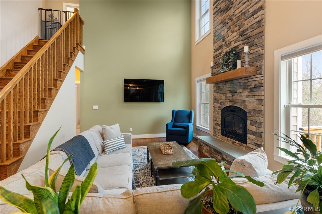 6150 Advance Mills Road Ruckersville, VA 22968 - Photo 23 of 50 a living room with furniture a fireplace and a flat screen tv
