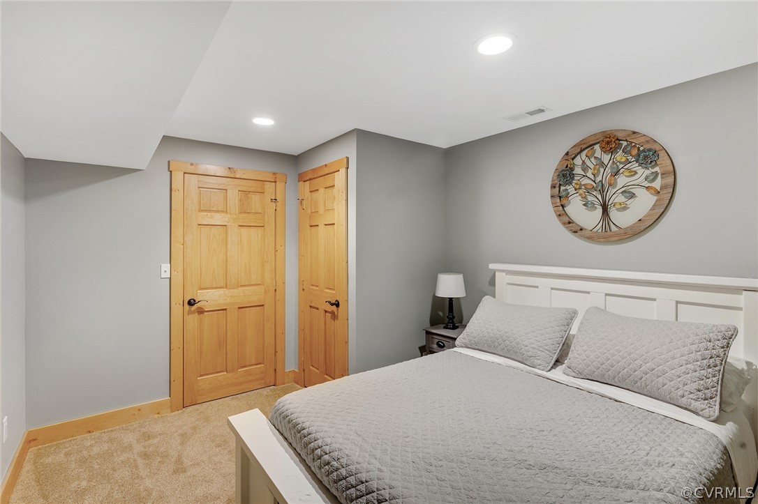 6150 Advance Mills Road Ruckersville, VA 22968 - Photo 36 of 50 a bedroom with a bed and a closet