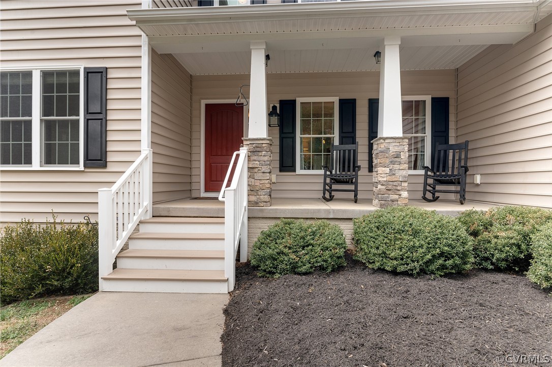 6150 Advance Mills Road Ruckersville, VA 22968 - Photo 4 of 50 a front view of a house with a yard
