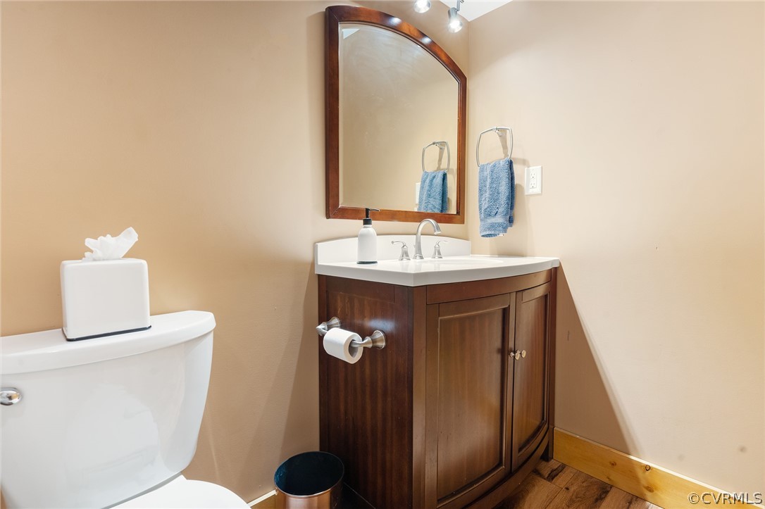 6150 Advance Mills Road Ruckersville, VA 22968 - Photo 42 of 50 a bathroom with a sink toilet and mirror