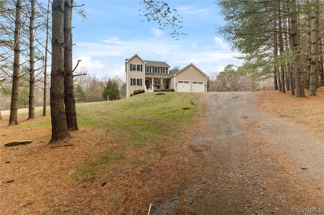 6150 Advance Mills Road Ruckersville, VA 22968 - Photo 7 of 50 a house with trees in front of it