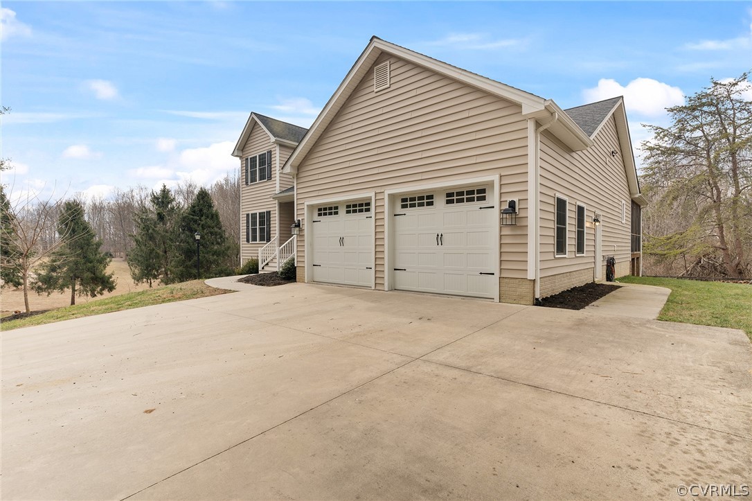 6150 Advance Mills Road Ruckersville, VA 22968 - Photo 8 of 50 a view of a house with a yard