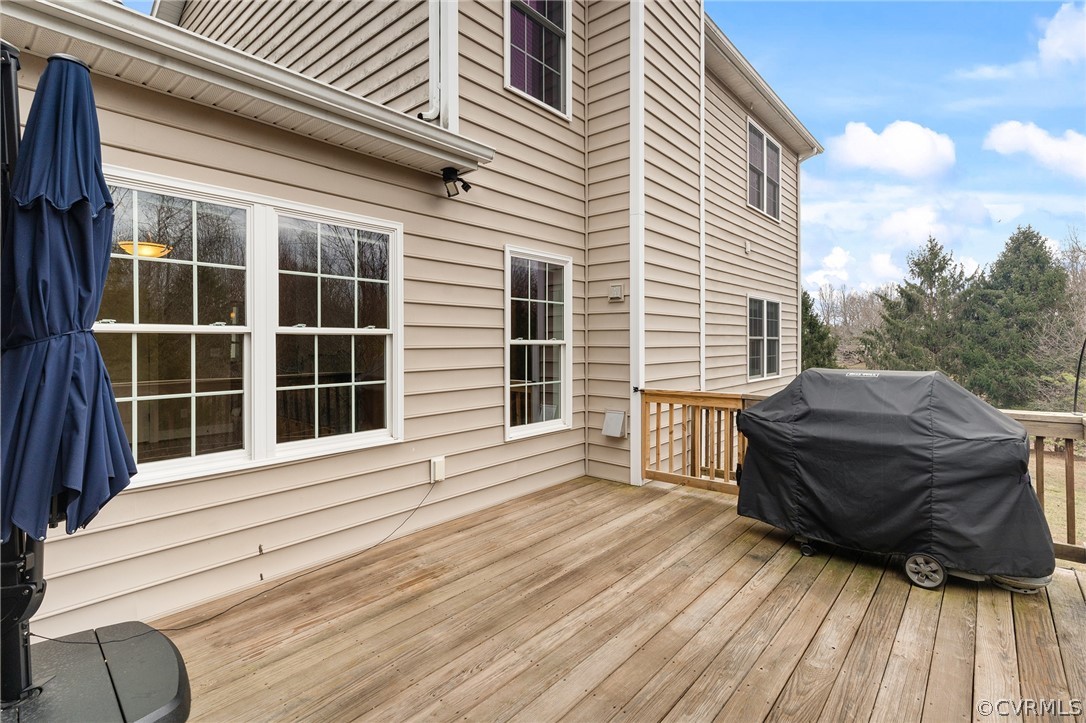 6150 Advance Mills Road Ruckersville, VA 22968 - Photo 10 of 50 a view of a house with a large window and wooden floor