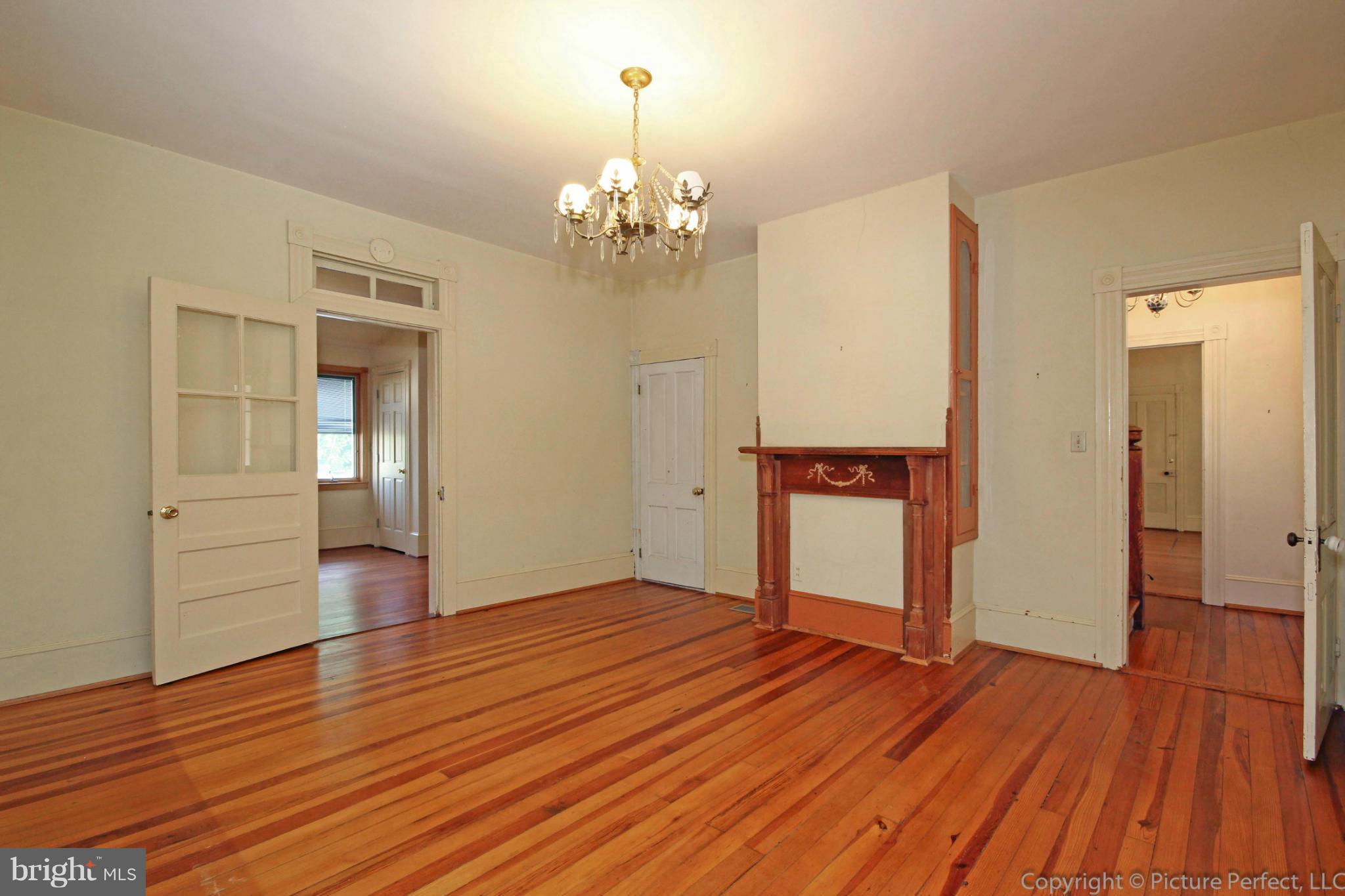 1801 Long Corner Road Mount Airy, MD 21771 - Photo 14 of 30 a view of an empty room with wooden floor