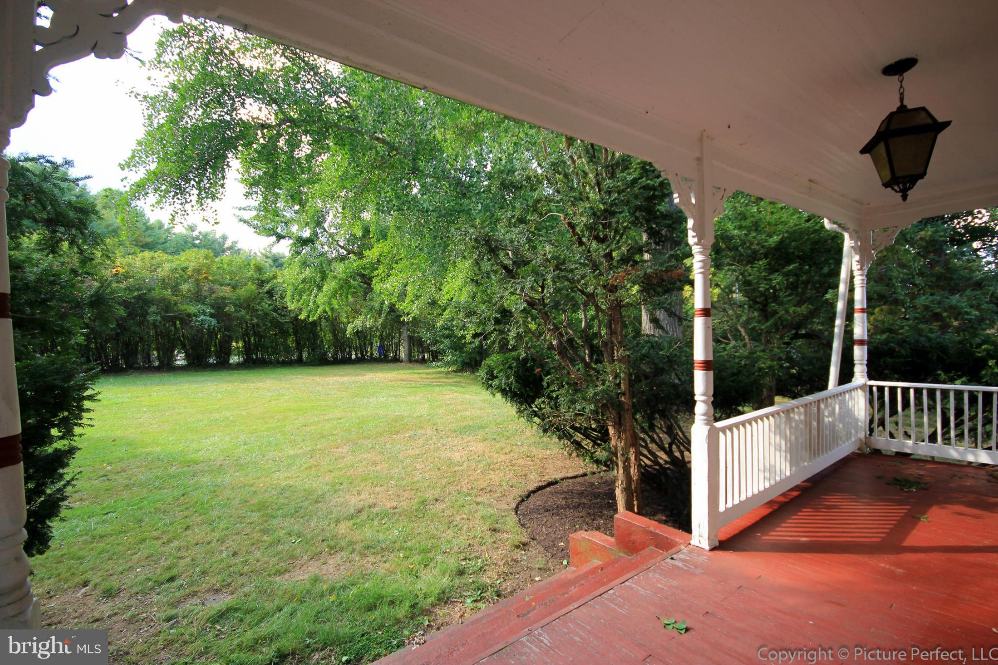 1801 Long Corner Road Mount Airy, MD 21771 - Photo 3 of 30 a view of a yard with porch