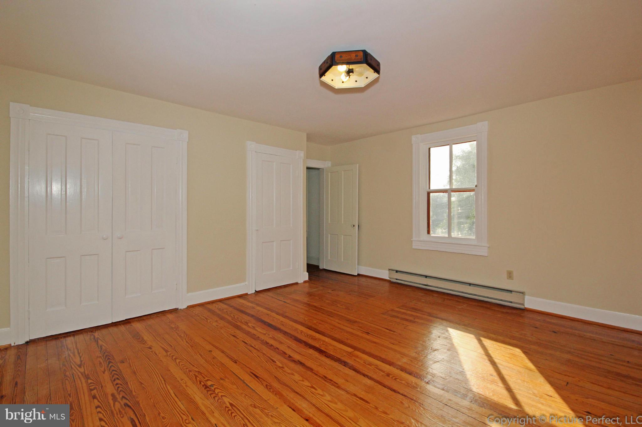 1801 Long Corner Road Mount Airy, MD 21771 - Photo 26 of 30 a view of an empty room and window