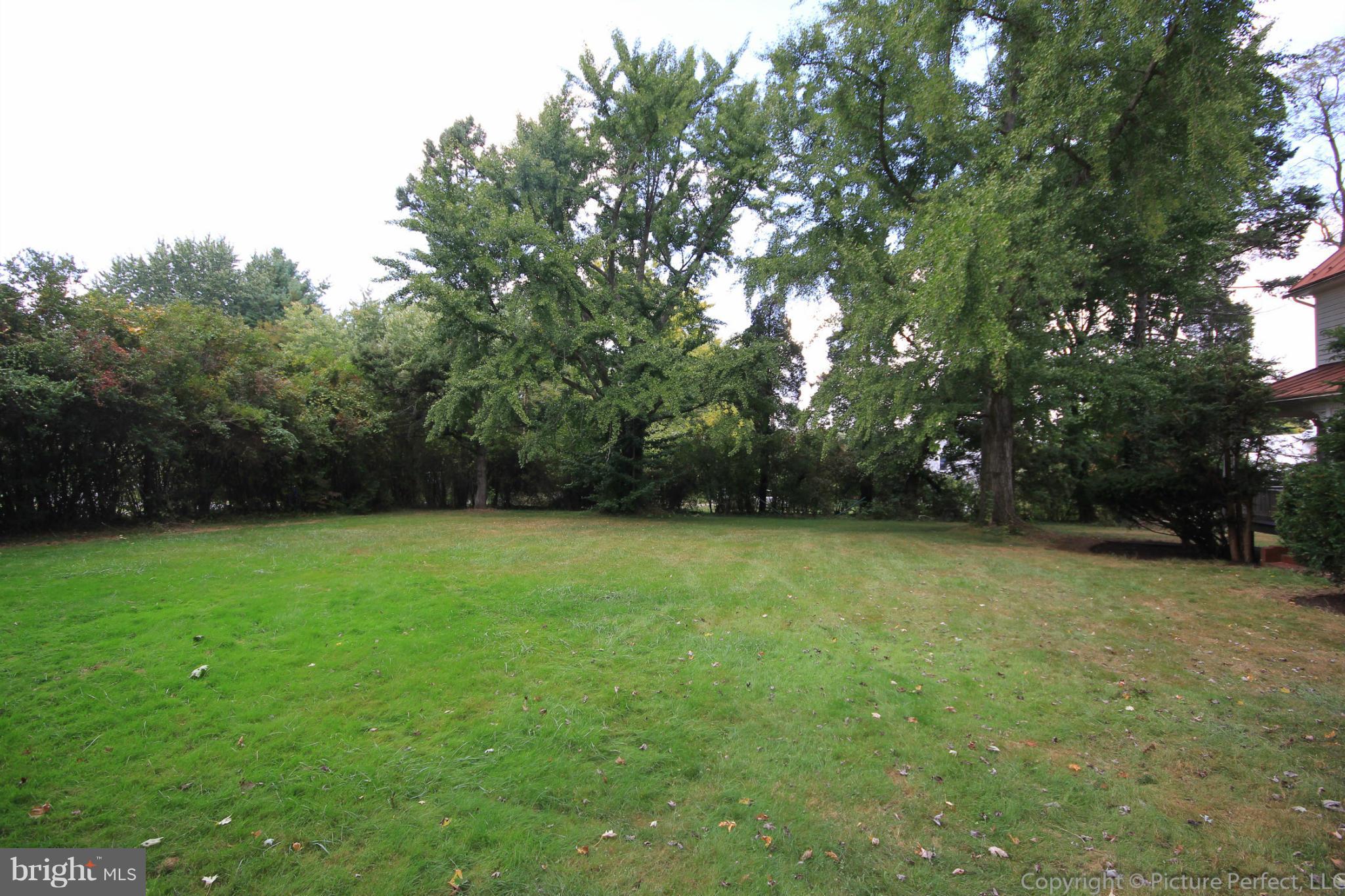 1801 Long Corner Road Mount Airy, MD 21771 - Photo 4 of 30 a view of a field of grass and trees