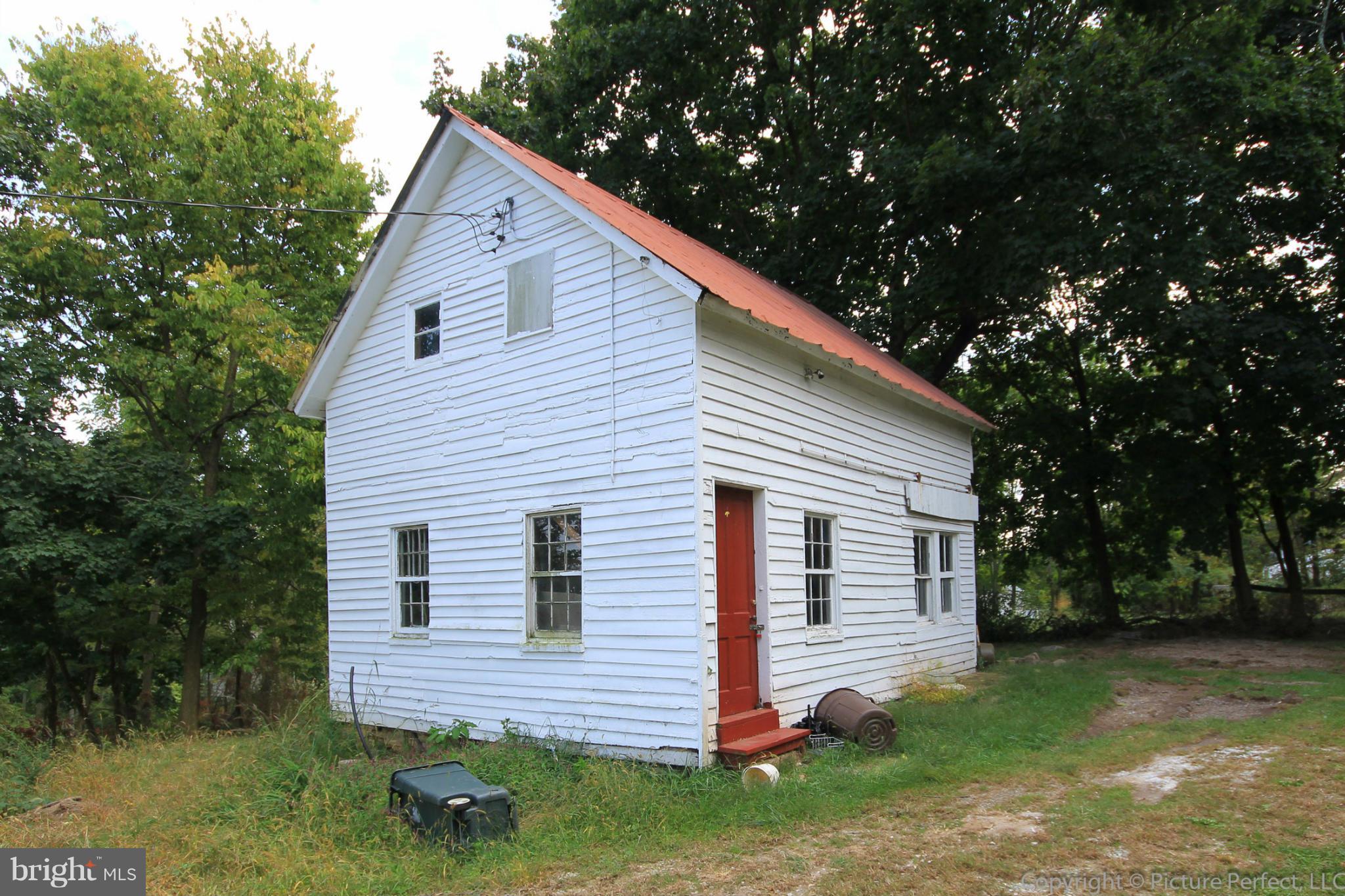 1801 Long Corner Road Mount Airy, MD 21771 - Photo 7 of 30 a view of a house with a yard