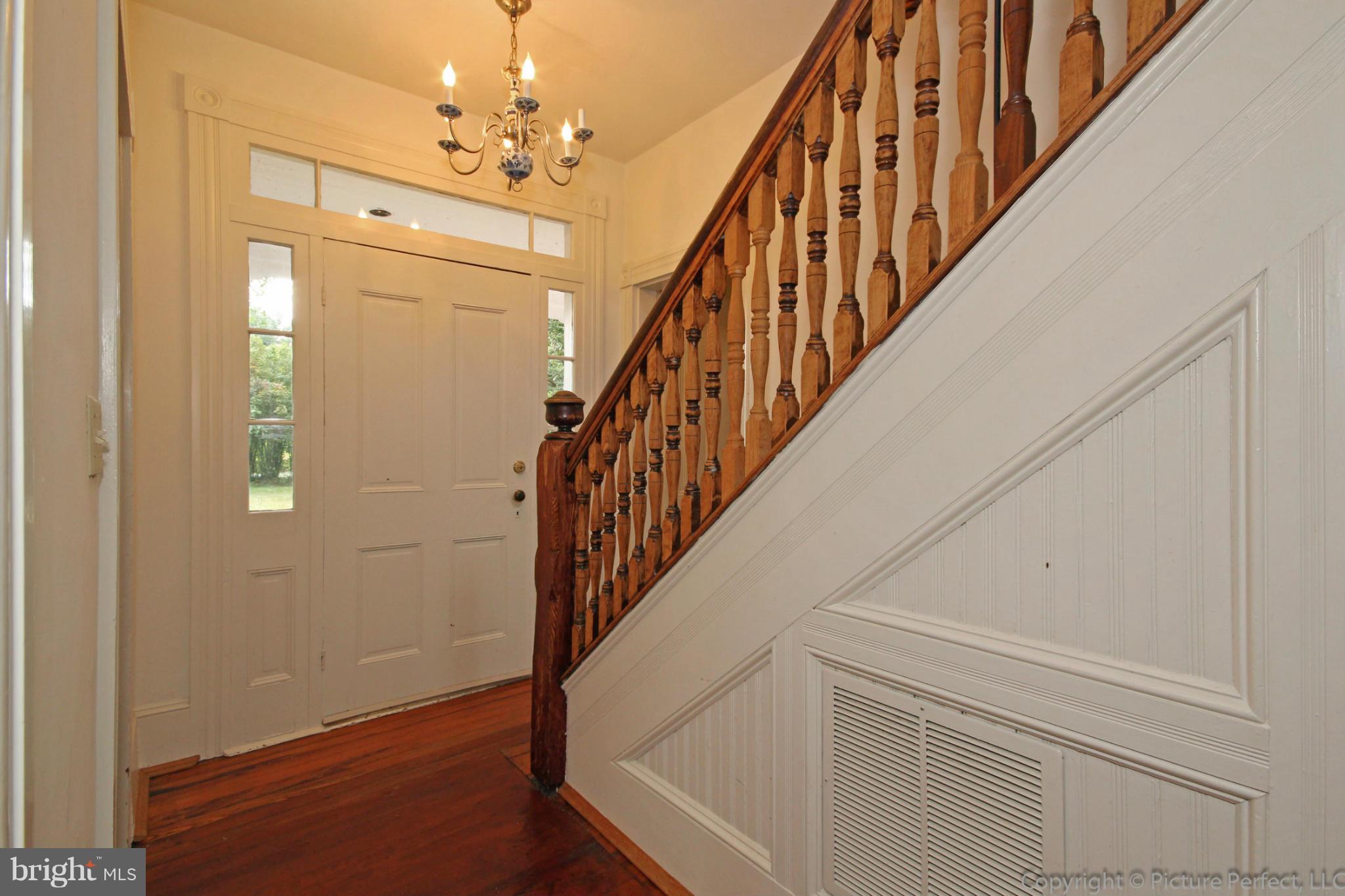 1801 Long Corner Road Mount Airy, MD 21771 - Photo 8 of 30 a view of staircase with wooden floor and staircase