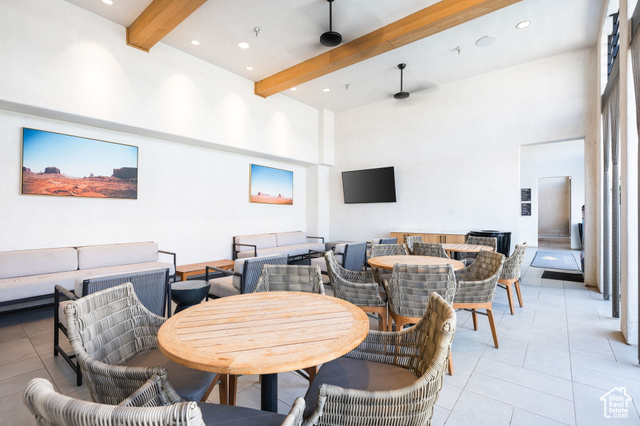 961 West Akoya Pearl Road, Unit 201 St. George, UT 84790 - Photo 56 of 67 Dining room featuring beamed ceiling, a towering ceiling, recessed lighting, and light tile patterned floors
