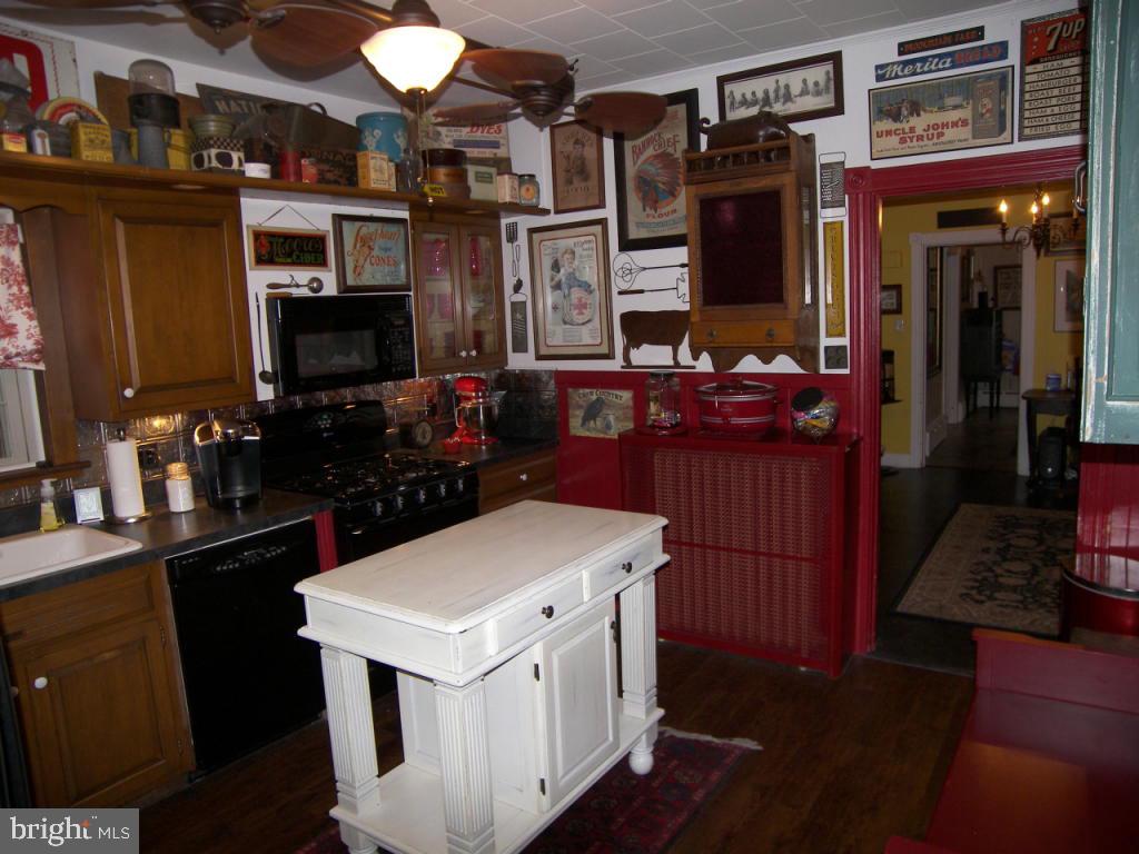 153 South Spruce Street Lititz, PA 17543 - Photo 11 of 32 a kitchen that has a lot of cabinets in it