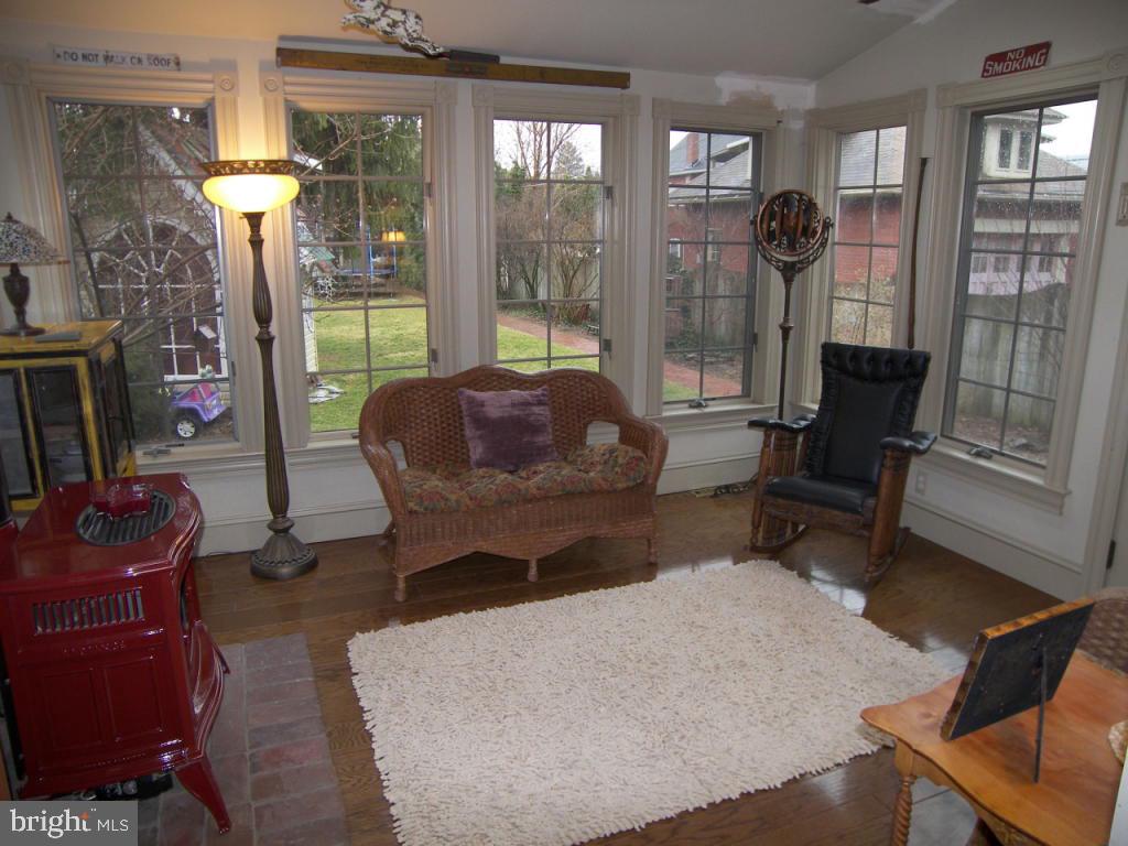 153 South Spruce Street Lititz, PA 17543 - Photo 13 of 32 a living room with furniture and a floor to ceiling window