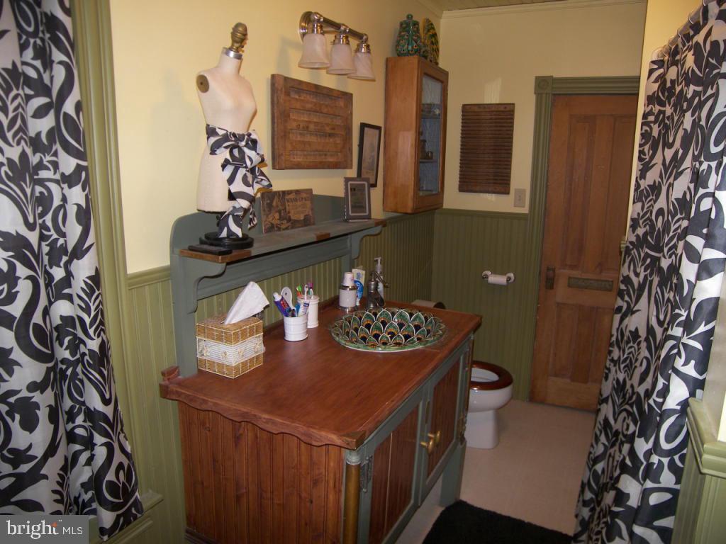 153 South Spruce Street Lititz, PA 17543 - Photo 19 of 32 a bathroom with a sink and a mirror