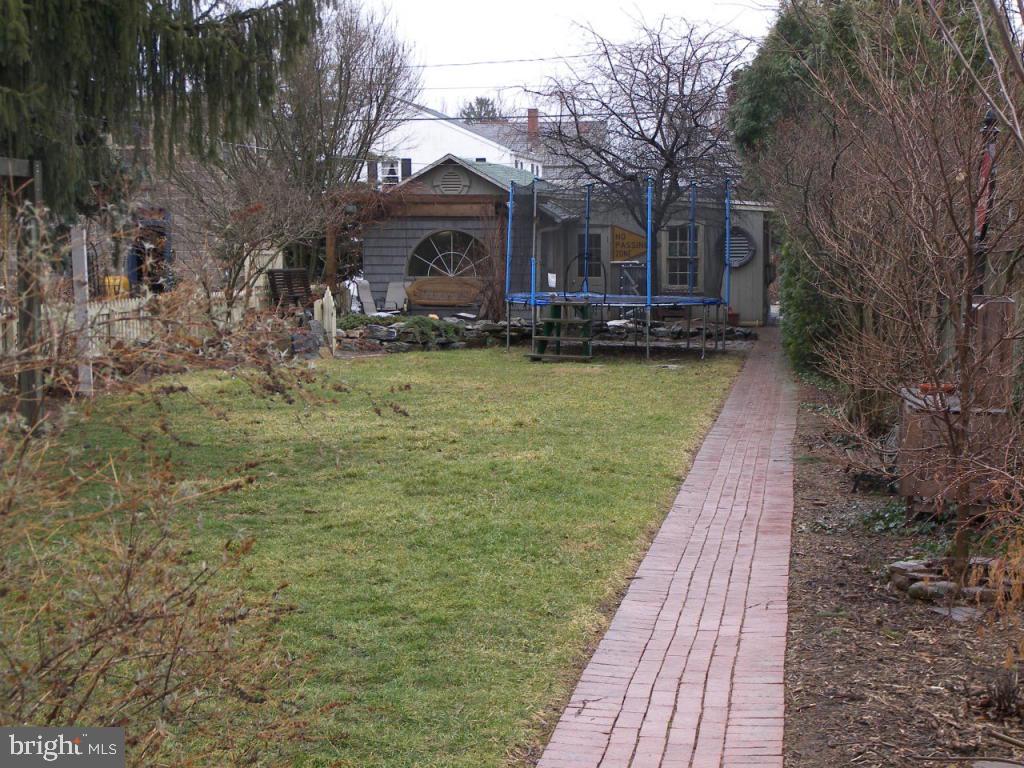 153 South Spruce Street Lititz, PA 17543 - Photo 27 of 32 a front view of a house with a yard