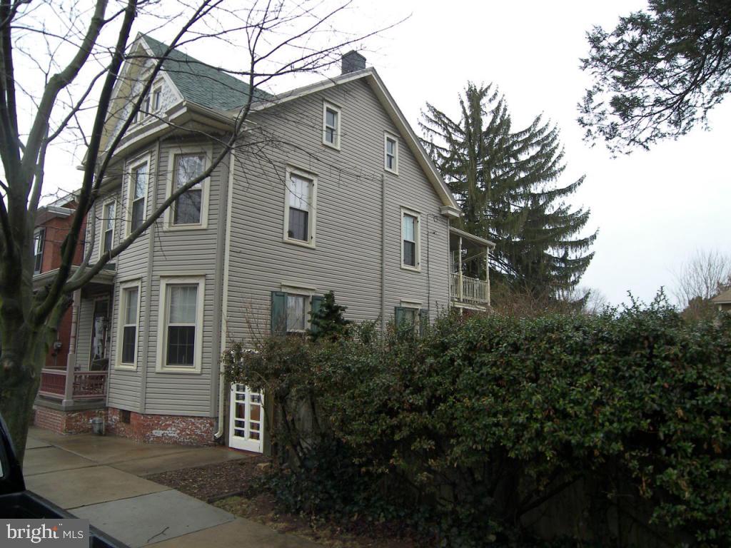 153 South Spruce Street Lititz, PA 17543 - Photo 32 of 32 a front view of a house with trees