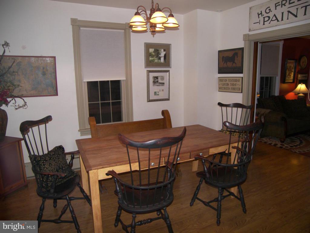 153 South Spruce Street Lititz, PA 17543 - Photo 6 of 32 a view of a dining room with furniture and wooden floor