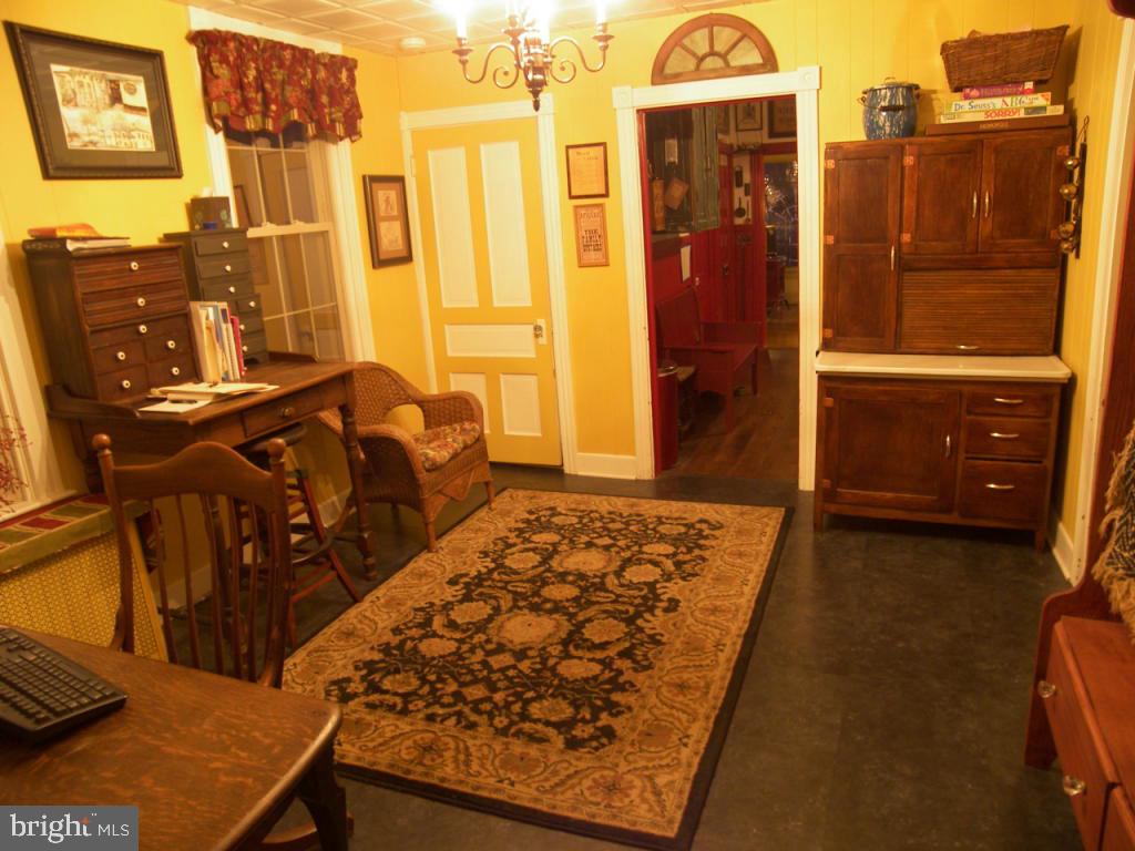 153 South Spruce Street Lititz, PA 17543 - Photo 9 of 32 a bedroom with a bed and wooden floor