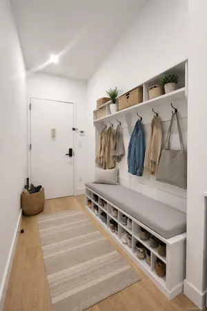 a bedroom with a bed and a walk in closet