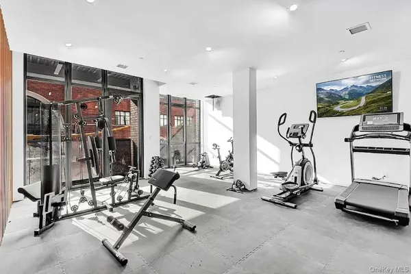 a view of a room with gym equipment