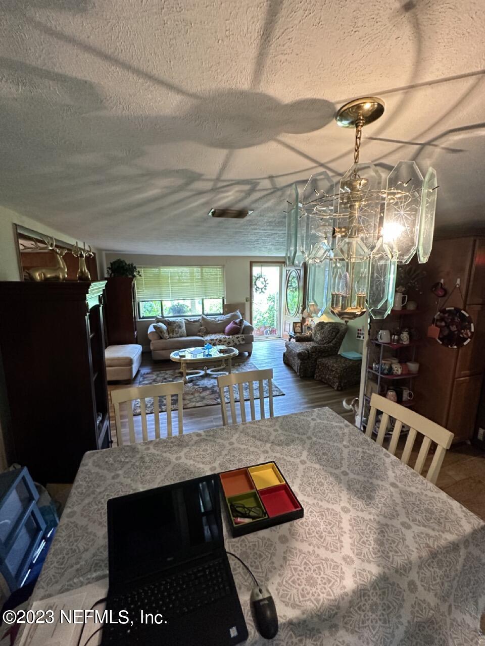 4479 Vinton Road Jacksonville, FL 32207 - Photo 11 of 45 a room with lots of furniture and a rug