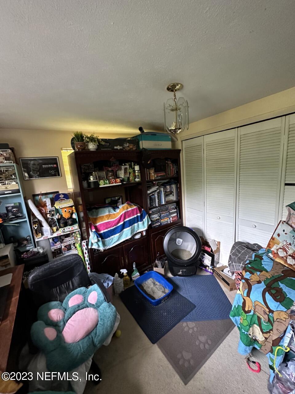 4479 Vinton Road Jacksonville, FL 32207 - Photo 25 of 45 a room with lots of stuff and toys