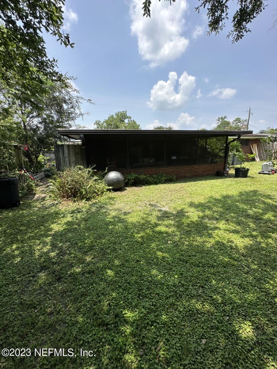 4479 Vinton Road Jacksonville, FL 32207 - Photo 42 of 45 a backyard of a house with lots of green space